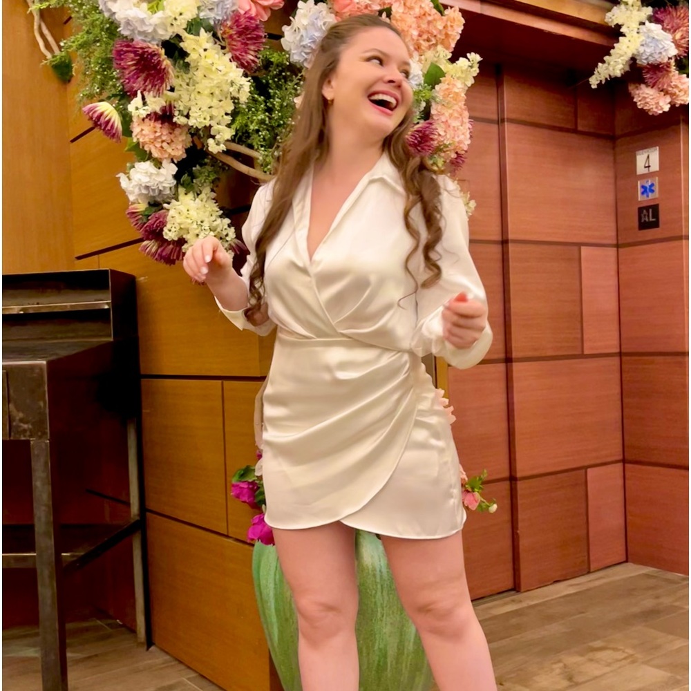 Zara’s white satin dress